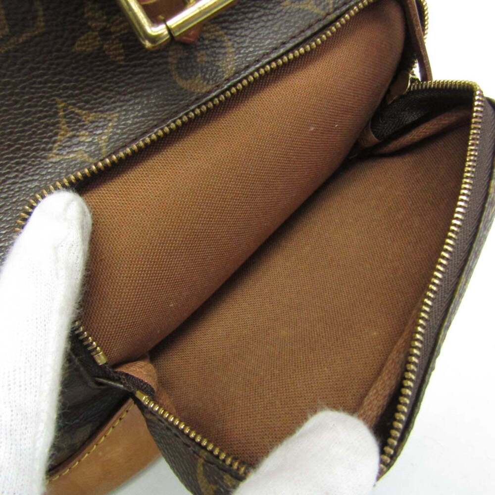 LOUIS VUITTON Brown Monogram Backpack - Picture 15 of 16